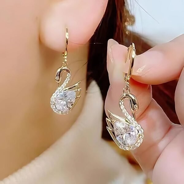 Sparkling Swan Huggie Earrings